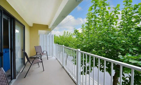 Great 2Br Condo in North OC With Indoor Pool. 1 Block To The Spacious Beach!